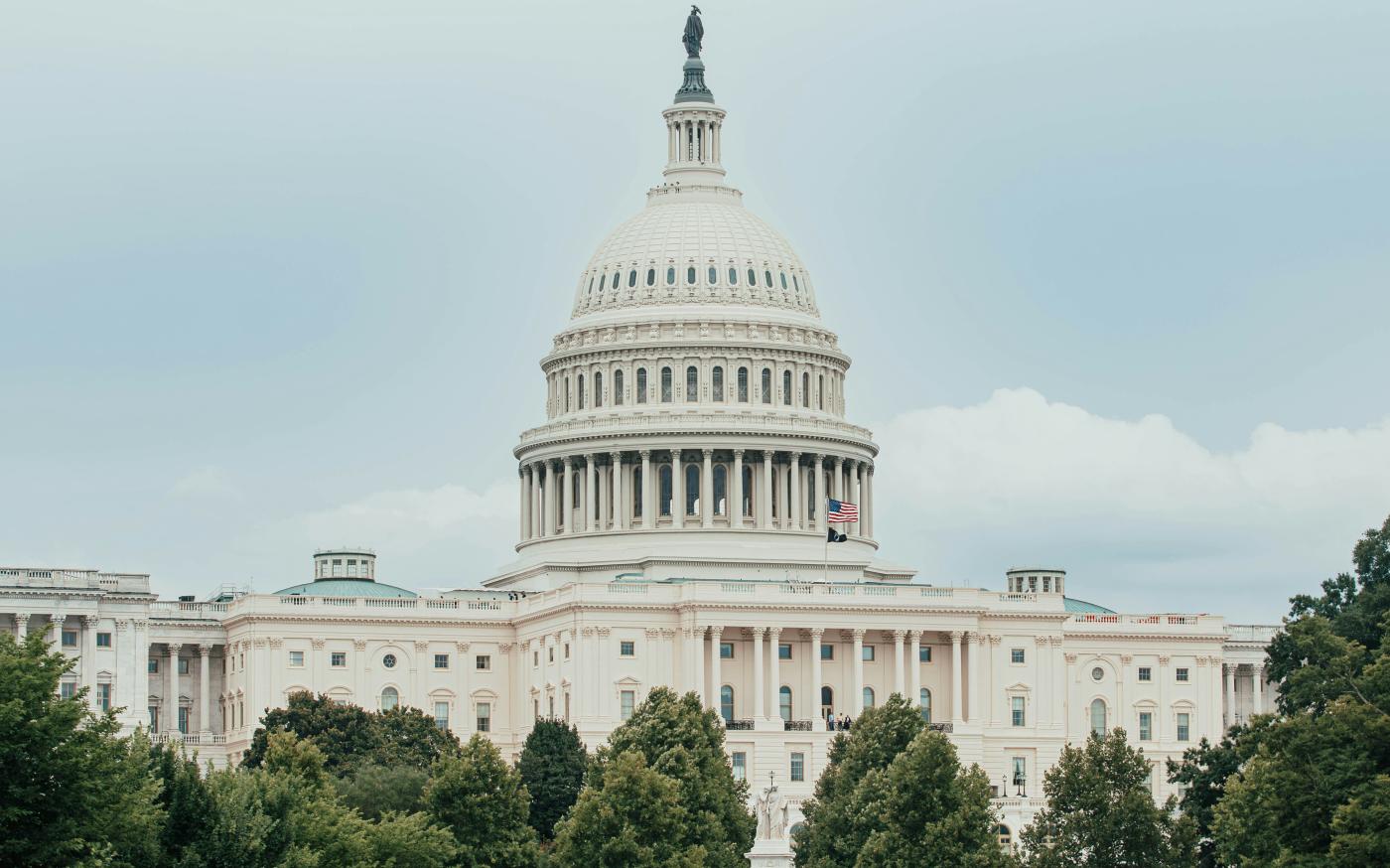 A view of the capitol building from across the water by Connor Gan courtesy of Unsplash.