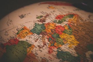 white red and green map by Christian Lue courtesy of Unsplash.